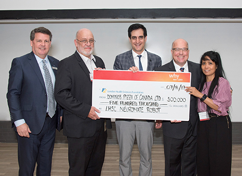 LHSF President and CEO John MacFarlane, LHSC President and CEO Murray Glendining, Co-director, LHSC Epilepsy Program Dr. David Steven, Domino's Pizza of Canada Ltd. CEO Michael Schlater, Lilibeth Schlater Michael Schlater and his wife Lillibeth Present Cheque