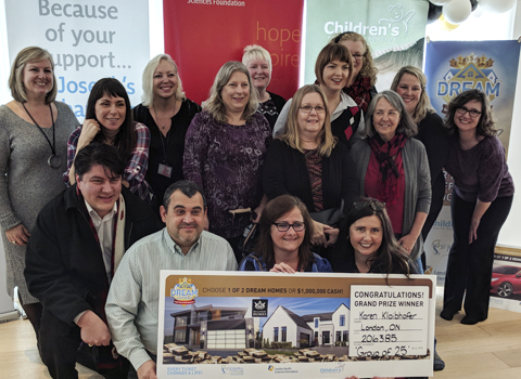 Several members of the group of 25 Fanshawe College colleagues who won the $1million Dream Lottery grand prize. Dream Lottery Winners