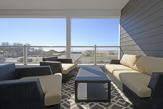 Spring is here, summer is on its way and a sun-filled balcony of the Dream Condo, overlooking the beach in Port Stanley, beckons.