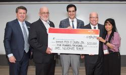 LHSF President and CEO John MacFarlane, LHSC President and CEO Murray Glendining, Co-director, LHSC Epilepsy Program Dr. David Steven, Domino's Pizza of Canada Ltd. CEO Michael Schlater, Lilibeth Schlater Michael Schlater and his wife Lillibeth Present Cheque